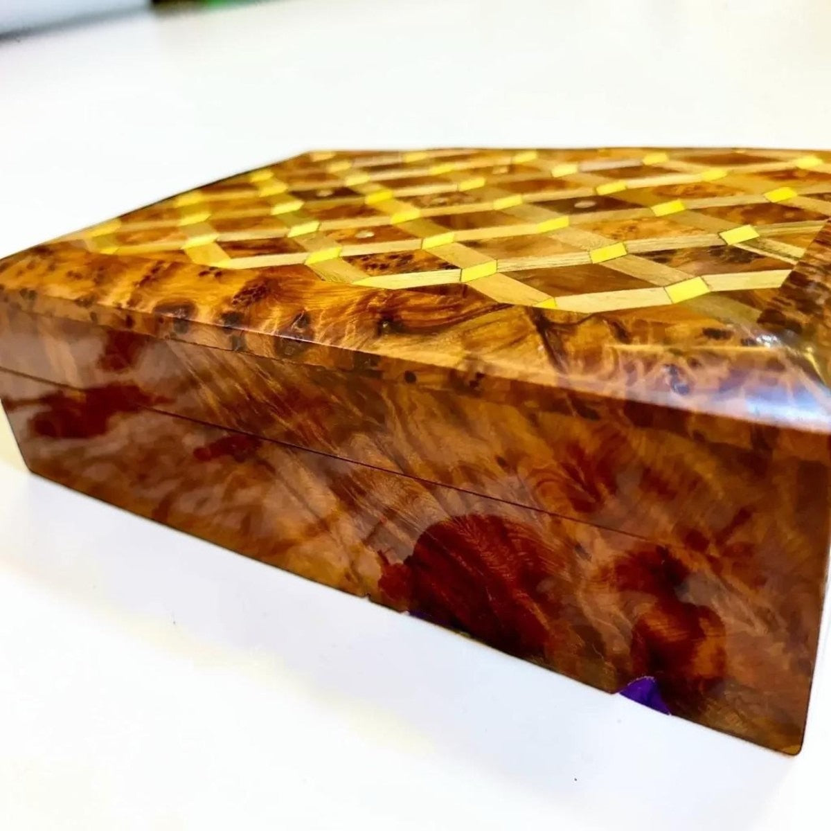 AtlasMuseCrafts ladies wooden jewelry box made from Thuya burl wood with intricate geometric inlay on the lid. Features warm amber tones and swirling grain patterns.