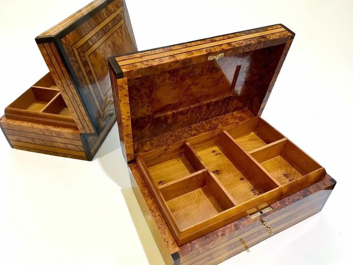 Thuya burl wood jewelry box showing polished grain and large storage layout