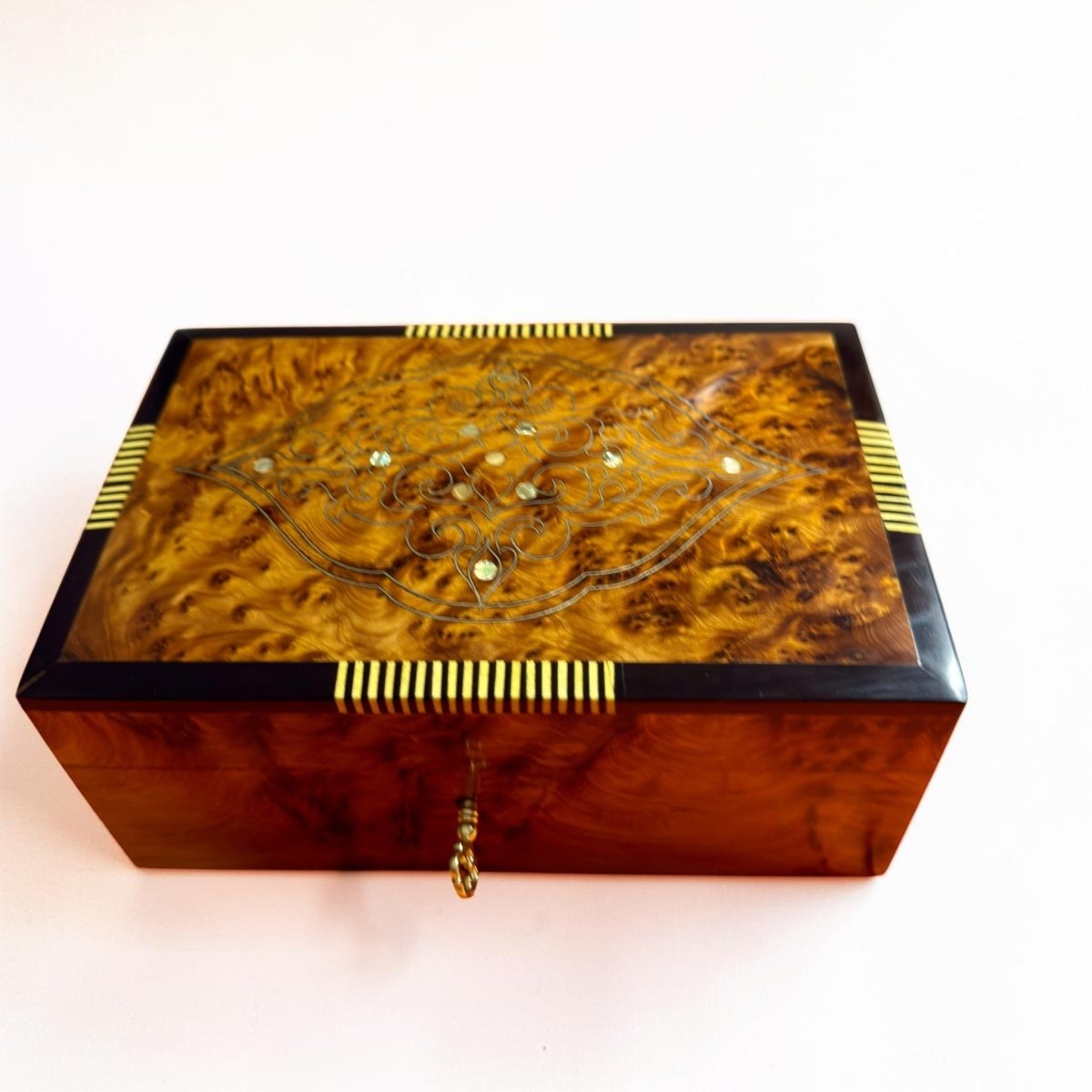 Handmade Thuya wood jewelry box with decorative inlay and brass lock