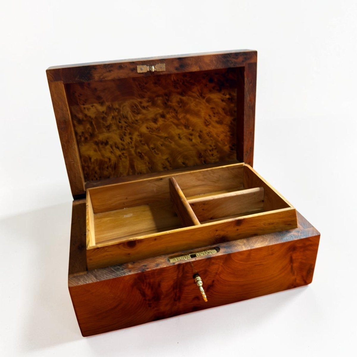 Open lockable jewelry box with multi compartment interior and Thuya burl wood