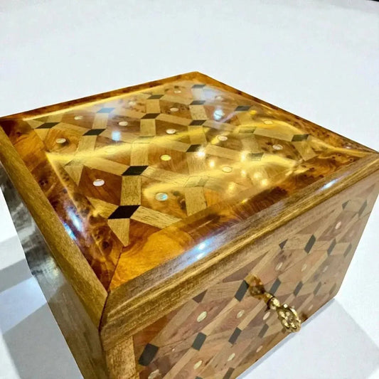 Luxury wooden box handmade from Moroccan Thuya burl with geometric inlay and brass key