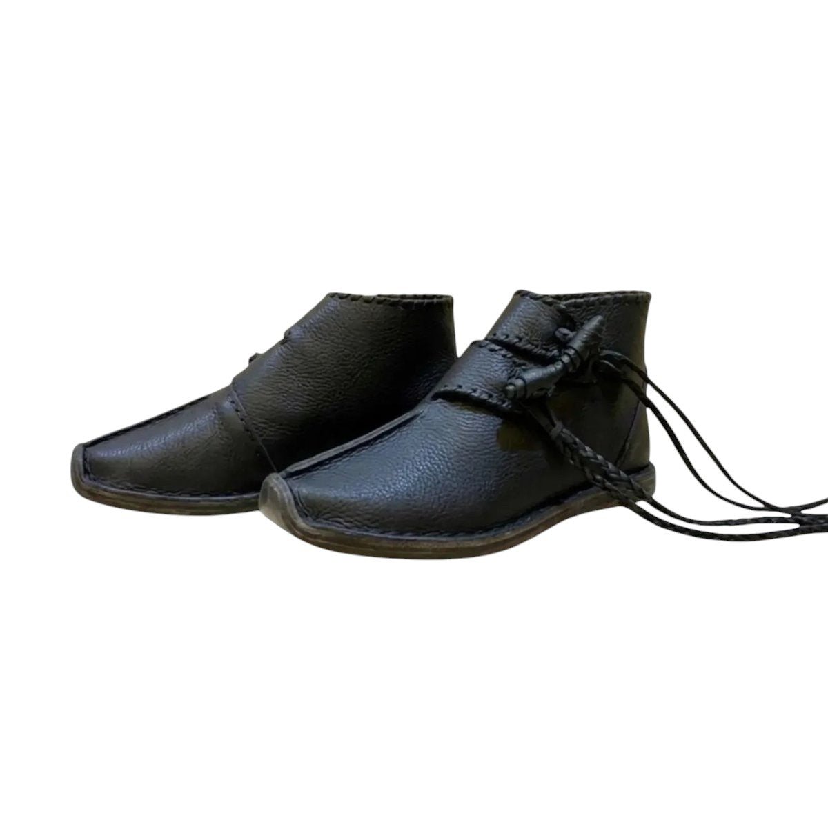 AtlasMuseCrafts black full-grain cowhide medieval boots with toggle closure and leather sole.