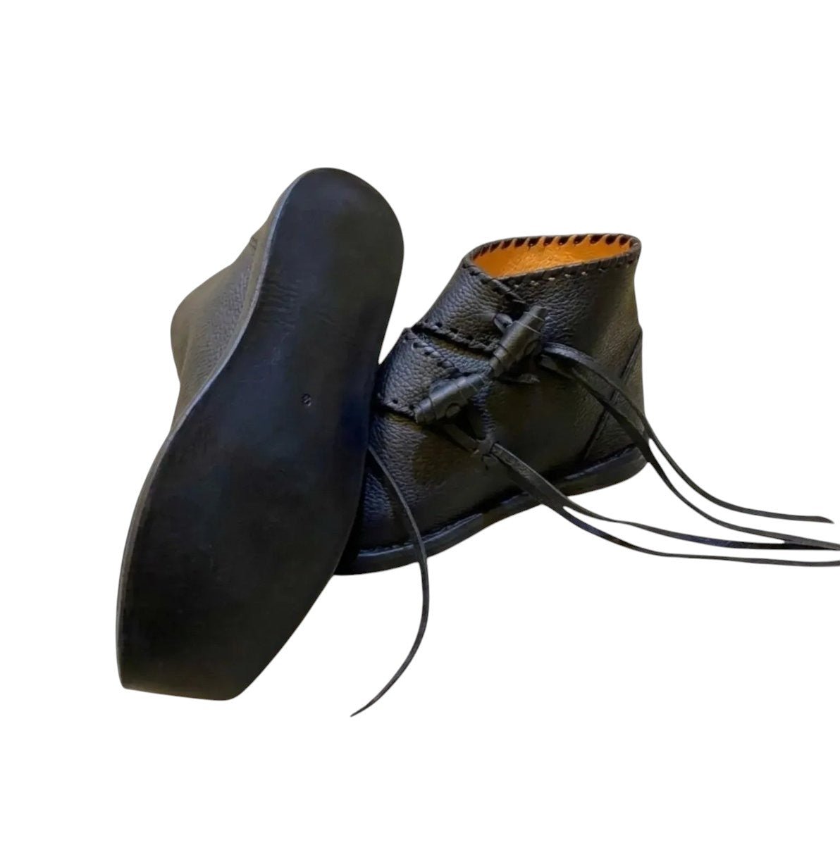 AtlasMuseCrafts black full-grain cowhide medieval shoes for men, handmade with leather sole and toggle closure.