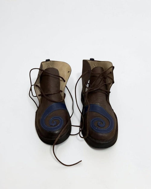AtlasMuseCrafts brown leather medieval poulaines with blue swirl detail and pointed toe, lace-up closure.
