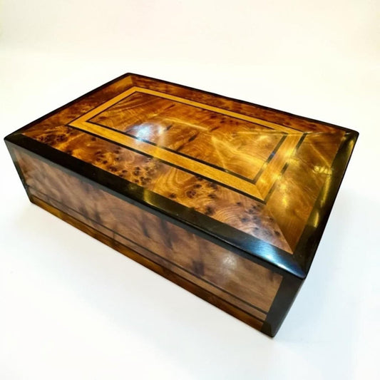 Moroccan Thuya storage box with burl wood grain and dark wood inlay