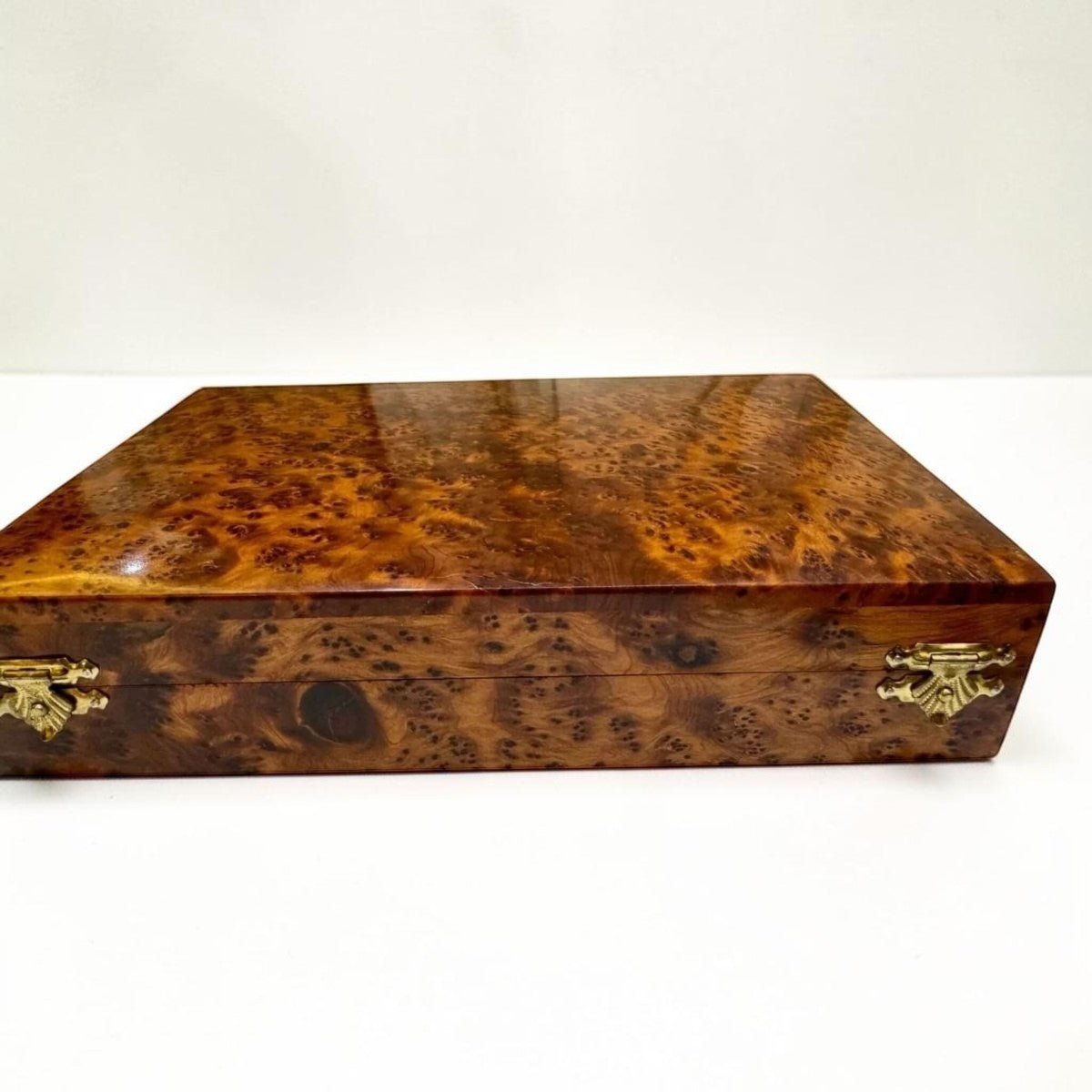 Wooden pencil case handmade from Thuya burl wood with ornate brass clasps