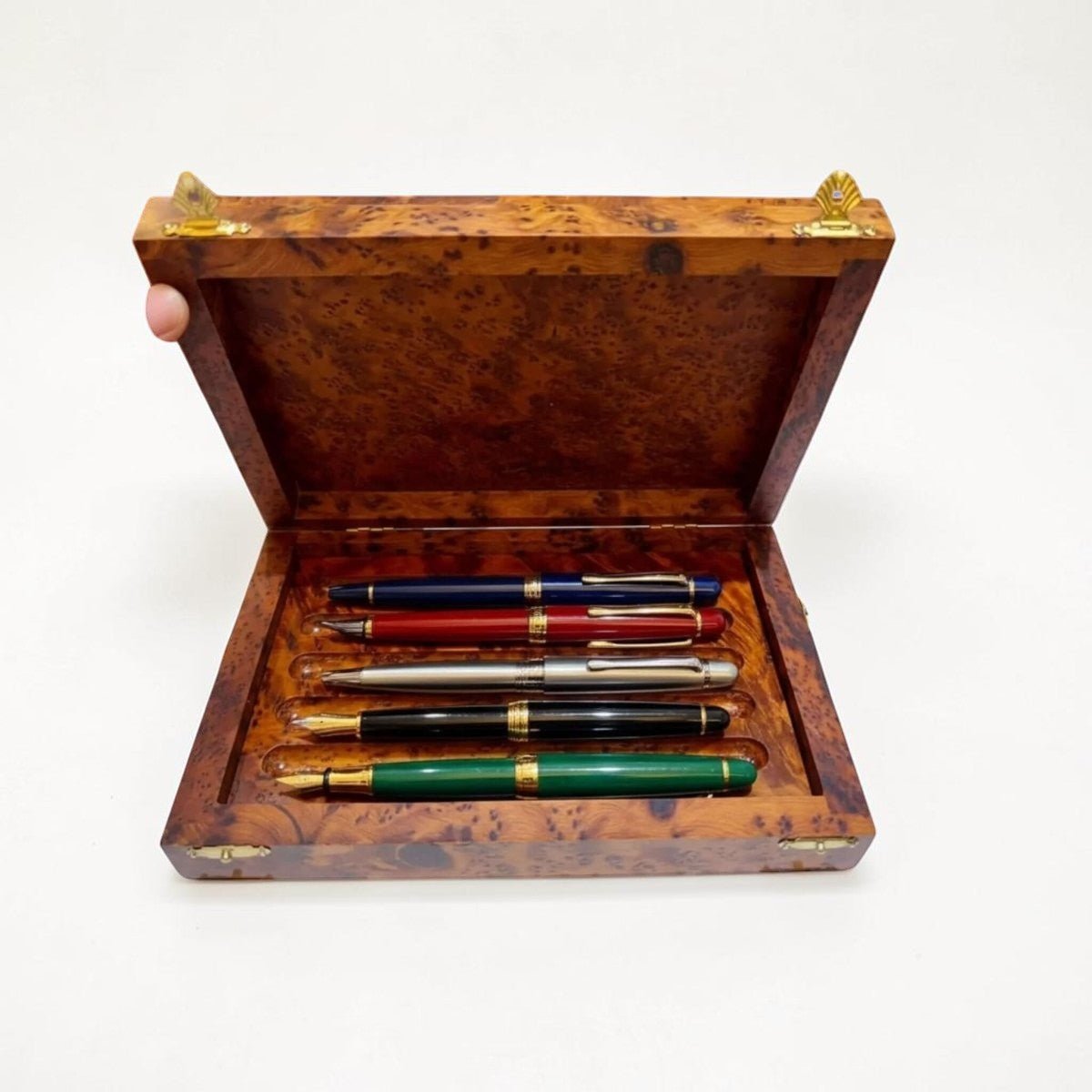 Thuya wood pencil case handmade in Morocco with pens and polished burl grain
