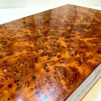 Moroccan Thuya wooden pencil case showing warm amber burl grain and smooth finish