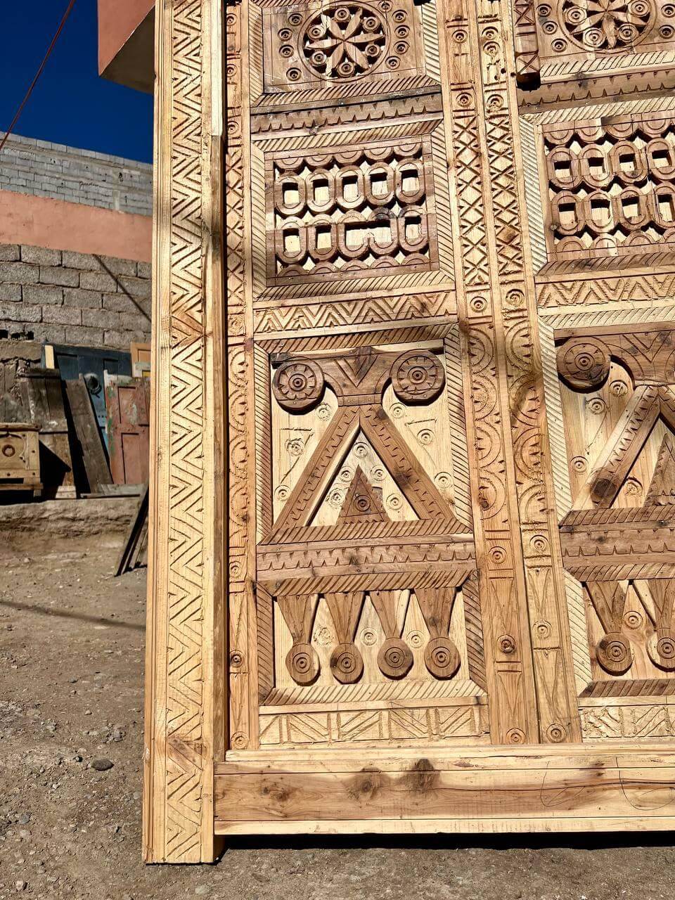 Custom carved Moroccan door for design-forward Airbnbs