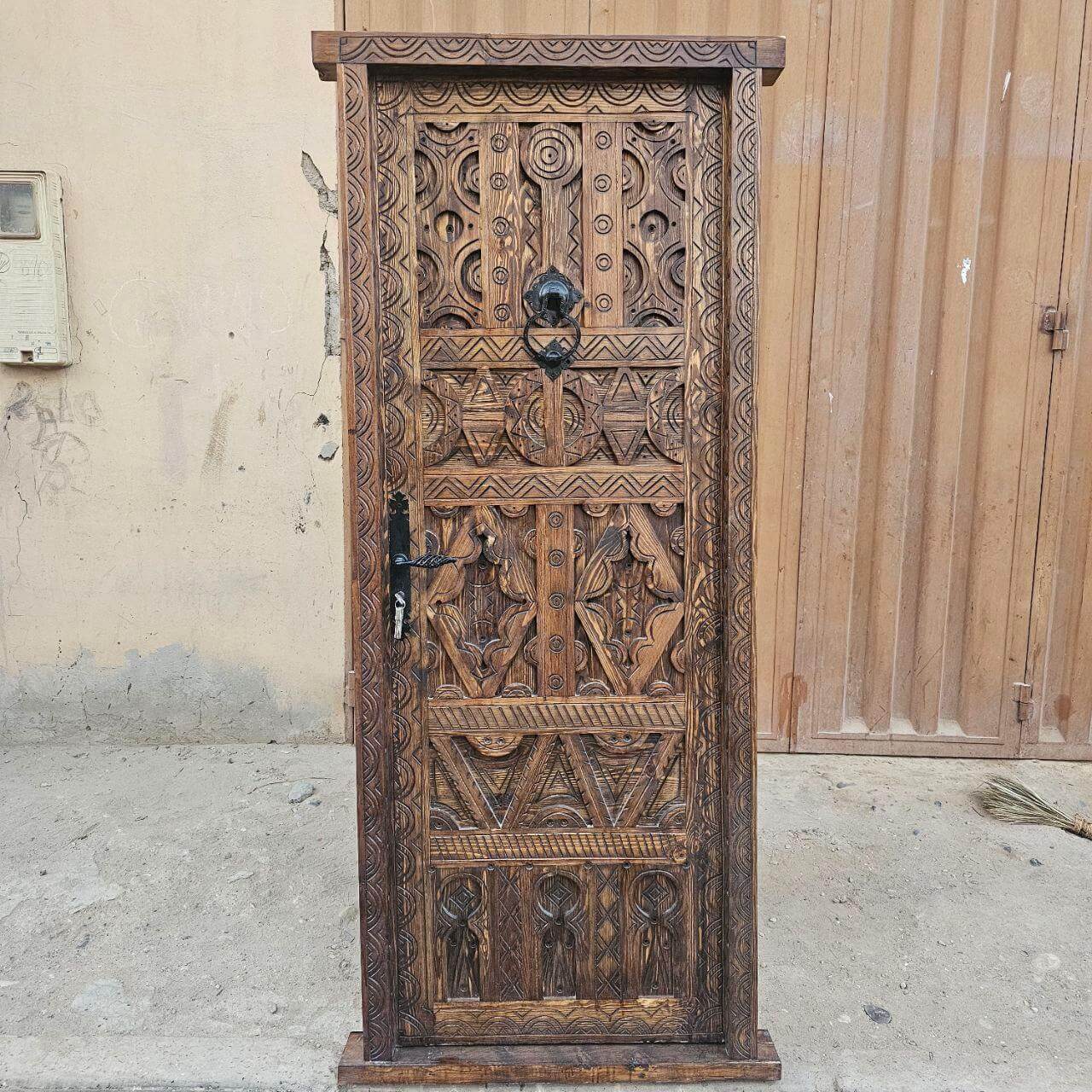 Handcrafted vintage single door with Berber hand-carving