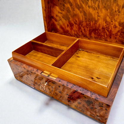 Wooden Box With Key showcasing a unique thuya burl design and interior compartments.