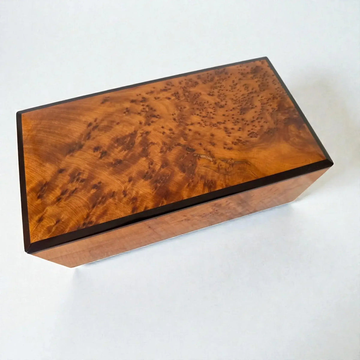 Moroccan Wooden Chest – Handmade Thuya Wood Keepsake Box with rich amber tone and unique Thuya burl grain detail.