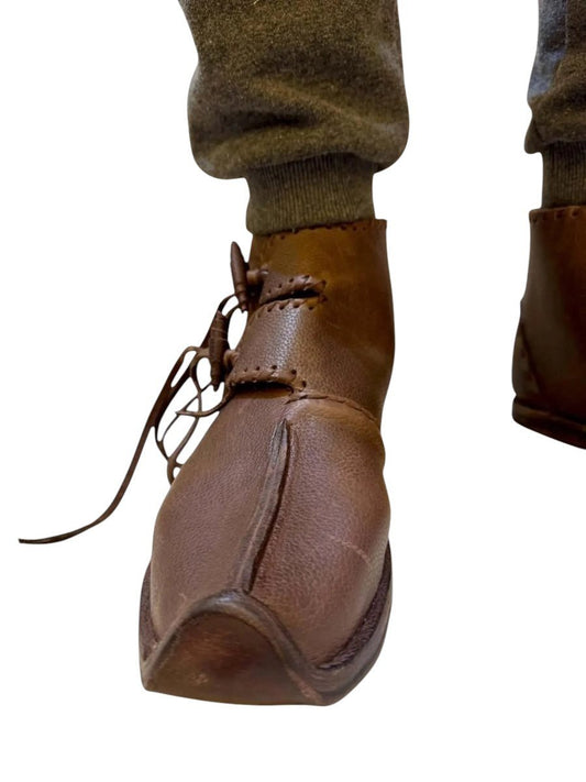 AtlasMuseCrafts brown full-grain leather handmade medieval Renaissance shoes with toggle closure and laces.