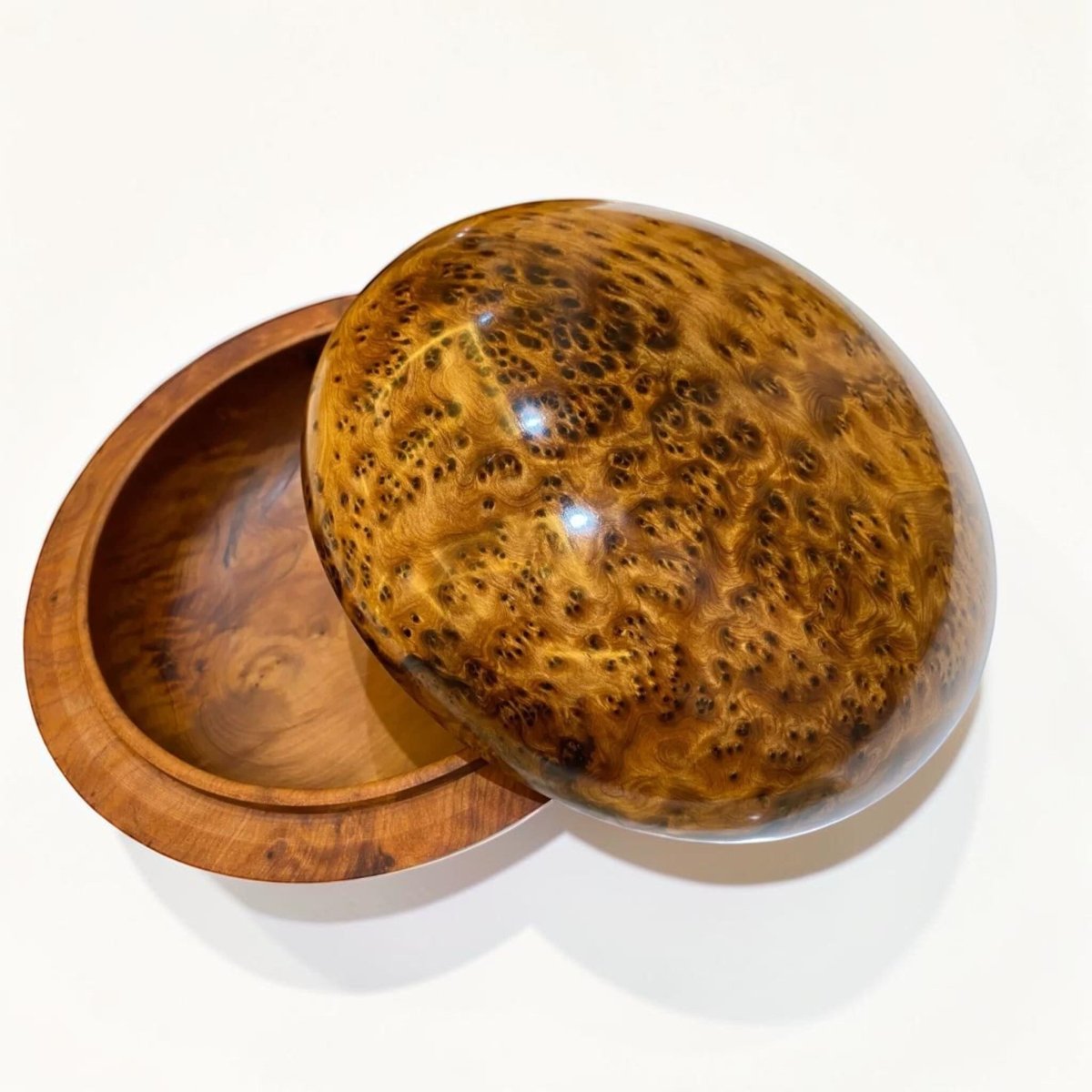 Round jewelry box organizer made from polished Moroccan Thuya burl wood