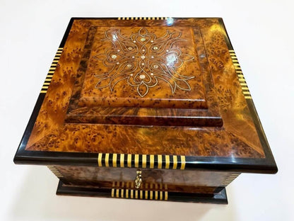 Royal Wooden Jewelry Box – Luxury Moroccan Thuya Burl Box features intricate design and rich amber hues.