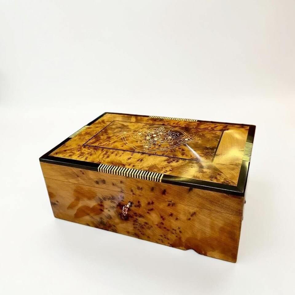 Thuya Wood Jewelry Box with Lock – Moroccan Burl, handcrafted with amber tones and intricate detailing.