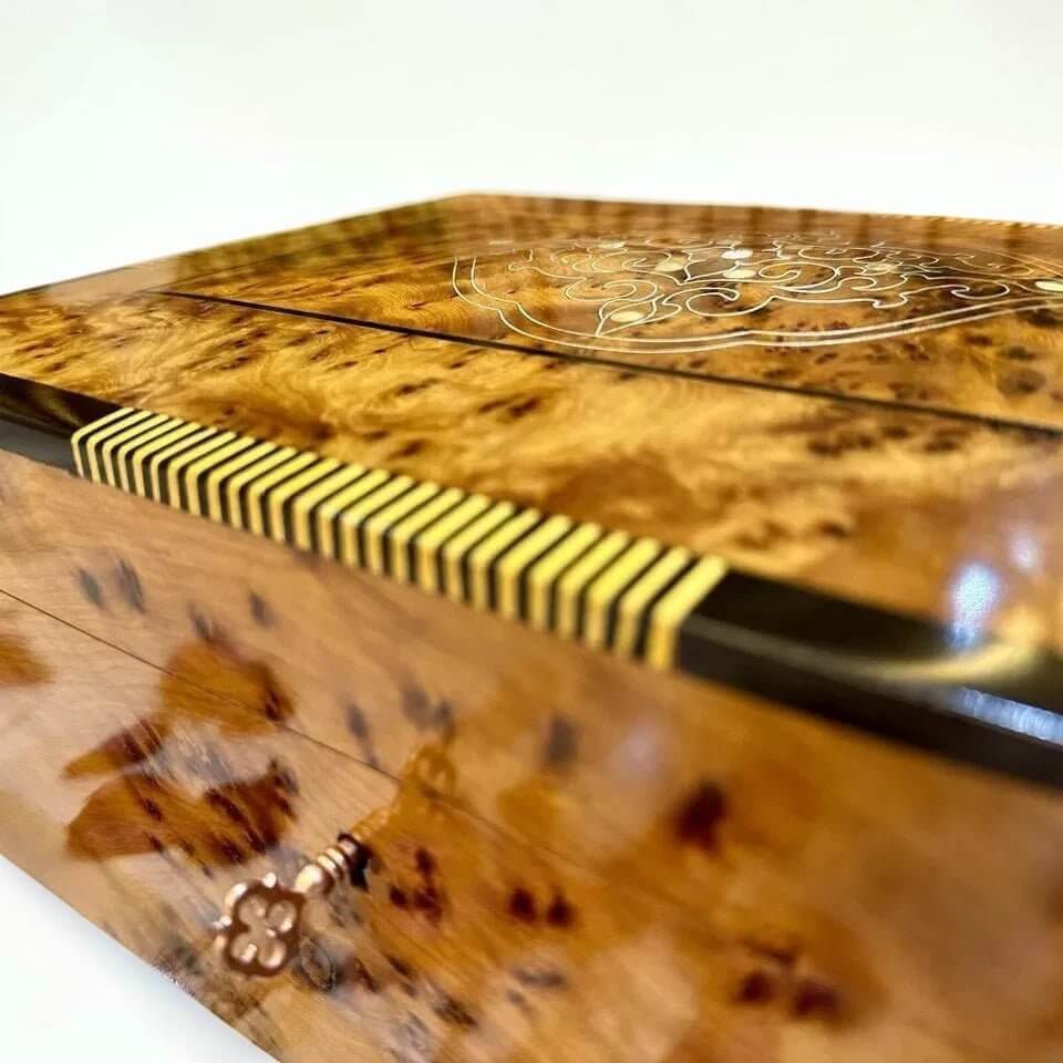 Thuya Wood Jewelry Box with Lock – Moroccan Burl, showcasing exquisite craftsmanship and rich amber tones.