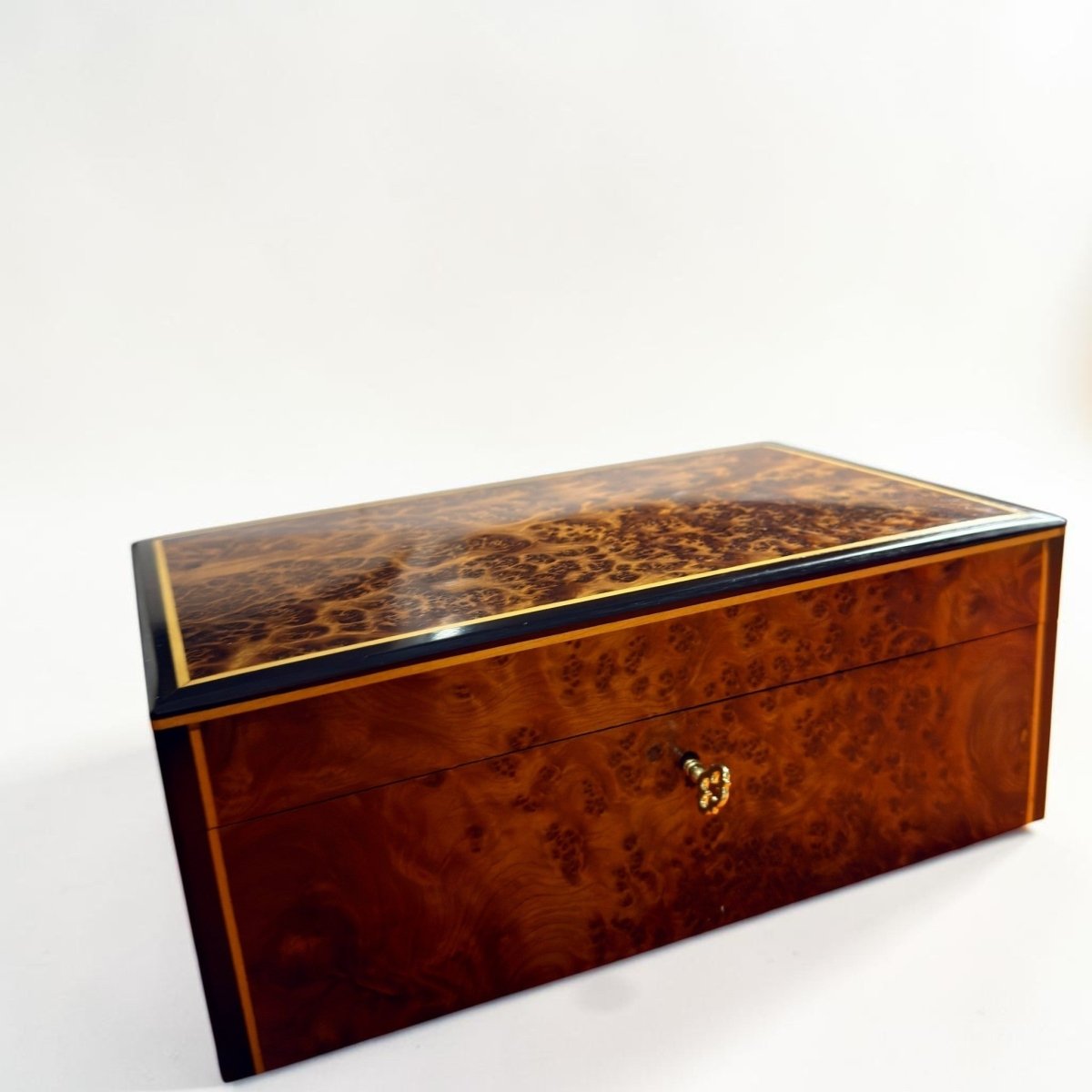 Thuya burl wood jewelry box with lock detail and polished finish