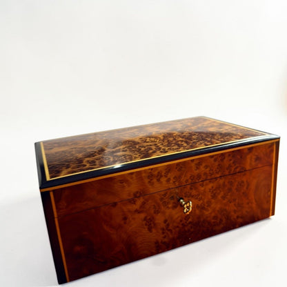Thuya burl wood jewelry box with lock detail and polished finish