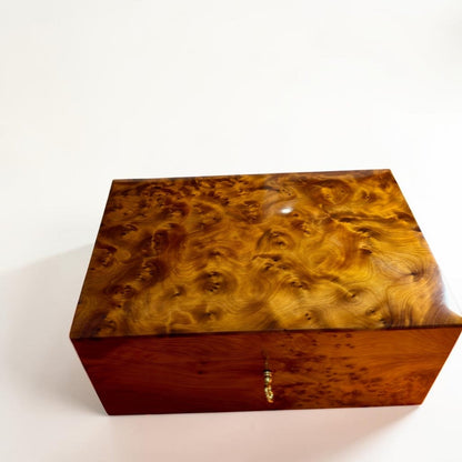 Wooden box with brass key and two tier storage for jewelry and letters