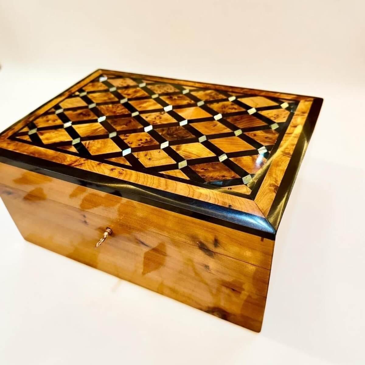 Decorative Moroccan jewelry box with inlaid lid and warm Thuya burl finish