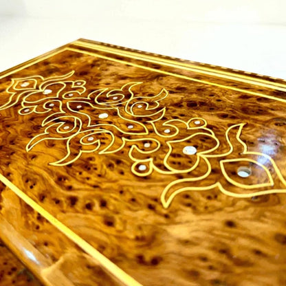 Handmade Thuya wood jewelry box with mirrored lid and storage compartments