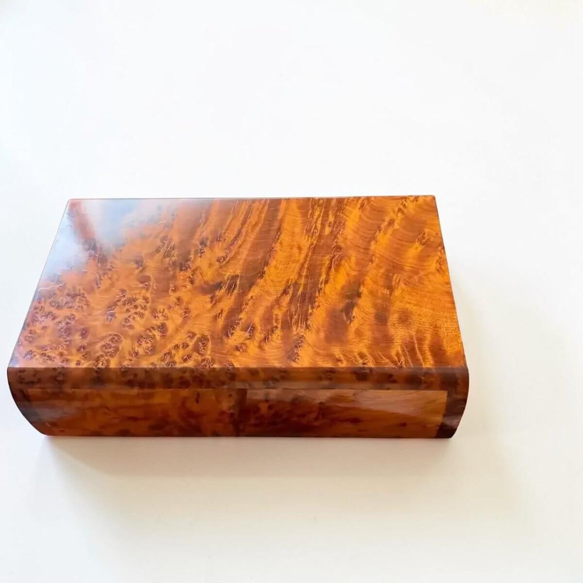Wooden Keepsake Box – Handmade Moroccan Thuya Storage Box showcasing rich amber Thuya burl wood grain and polished finish.