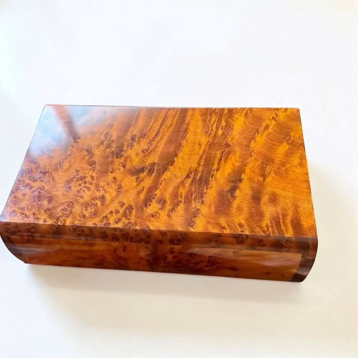 Handmade Moroccan Thuya Storage Box, luxurious amber Thuya burl wood, perfect for jewelry and keepsakes.