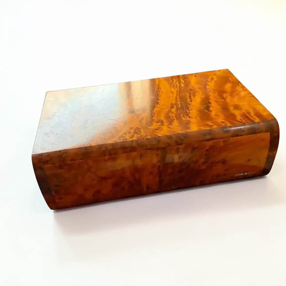 Handmade Moroccan Thuya Storage Box in warm amber tone, crafted from Thuya burl wood for jewelry and treasures.