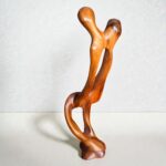 Handmade Moroccan Thuya sculpture with warm burl wood grain