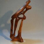 Wood carving sculpture handmade in Morocco for rustic shelf decor