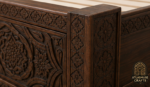 Carved Moroccan bed frame with decorative wooden side panels