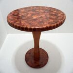 Round solid wood coffee table with mosaic top and pedestal base