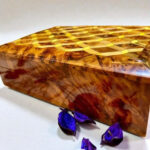 AtlasMuseCrafts luxury wooden jewelry box organizer made from Thuya burl wood with a geometric inlay pattern. Features a lockable design and two-level storage.