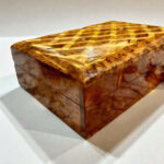 AtlasMuseCrafts handcrafted Thuya burl wood jewelry box with intricate geometric inlay on lid and brass key lock.