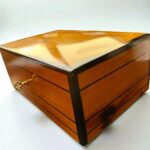 Decorative Wooden Keepsake Box made of polished Thuya burl wood with elegant brass clasp and vintage charm.