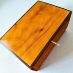 Decorative Wooden Keepsake Box made from Thuya burl wood with a polished finish and brass clasp.