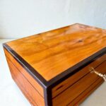 Decorative Wooden Keepsake Box made from Thuya burl wood, showcasing polished finish and elegant brass clasp.
