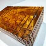 Puzzle Wooden Box with Hidden Compartments made of handcrafted Thuya burl wood featuring intricate designs.