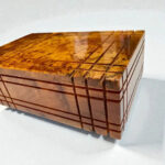 Puzzle Wooden Box with Hidden Compartments made from Thuya burl wood, showcasing intricate craftsmanship and a unique design.