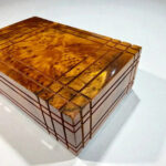 Puzzle Wooden Box with Hidden Compartments made from Thuya burl wood, showcasing intricate handcrafted design and elegant finish.
