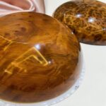 Handmade Moroccan Thuya burl wood round jewelry box organizer with a glossy finish.