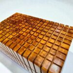 Detailed view of handcrafted Thuya wood box showcasing intricate burl patterns and unique craftsmanship.